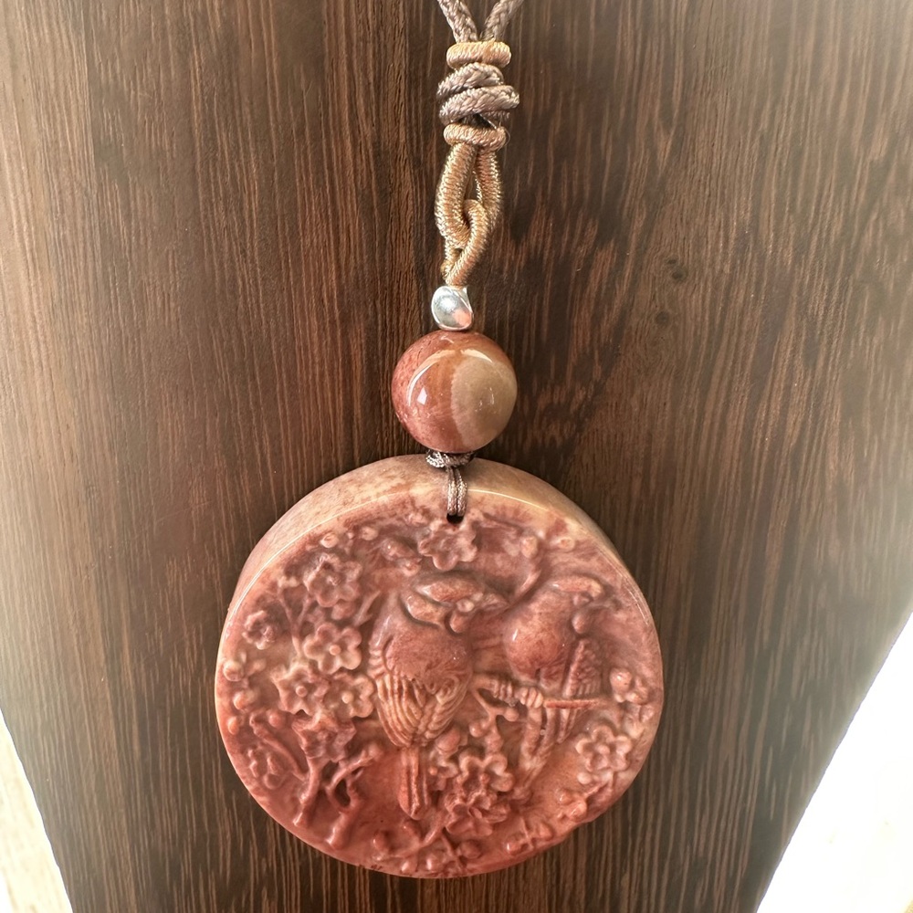 Coral Fossil Carved Round Bird Pendant Necklace on Tan Adjustable Rope - Picture 3 of 13